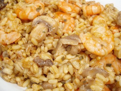 Risotto con code di gamberi e funghi