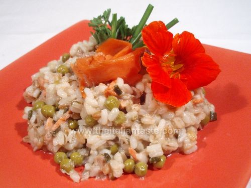 Risotto con tonno, salmone e piselli